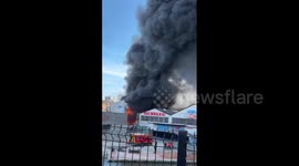 Massive smoke clouds as fire erupts at textile warehouse in Paris' Aubervilliers