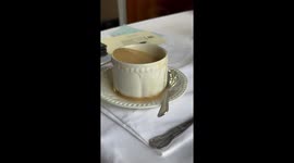 Trying to Drink Tea on a Bumpy Dining Car