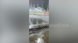 Fierce monsoon storm peels roof off hospital carpark in northeast Thailand
