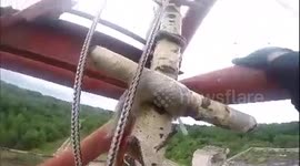 GALICH, RUSSIA: A DAREDEVIL teenager ended up among the clouds after climbing a 1150-foot-high TV tower in Russia.