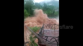 Torrential rainstorm ravages southern China, sweeping away bridge