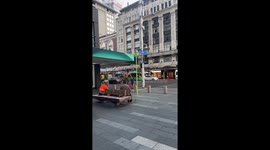 Man Takes a Tumble Walking on Street Barriers