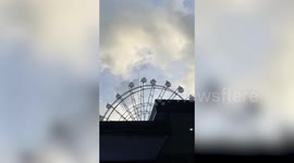 Storm blows Ferris Wheel gondolas in the Philippines