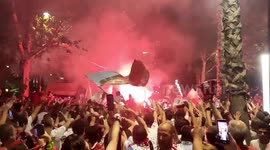 Fans wave flags in red-smoked sky as Sevilla FC wins 7th Europa League