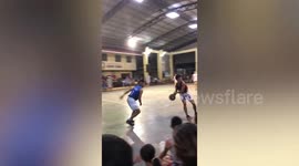 Basketball player hits insane buzzer-beater half-court shot and wins