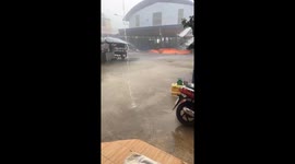 Strong winds blow away many roofs in a market in Vietnam