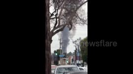 Large fire erupts at commercial building in Signal Hill, US state of California