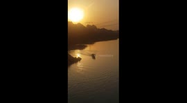 Beautiful View of Boat in River . Sun is about to Set . Nature is really Beautiful.