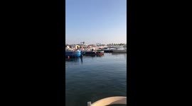 Boat Passenger Goes For A Swim