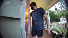 Rat Startles Man When It Jumps Off Birdfeeder