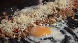 Watch mouthwatering giant 2ft-long crepes being made at this Thai street food stall