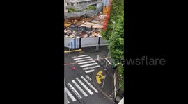 Japan: Crane Gives Way Due To Strong Winds In Kawasaki