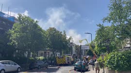 Firefighters battle to extinguish blaze burning through house in Finsbury Park