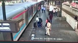 Railway official saves life of woman boarding train in western India