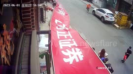 Chinese residents unite to rescue trapped women in billboard collapse