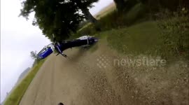Motorcycle riding wheelie and then loops bike and crashes