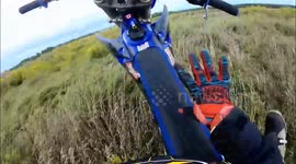 Funny flip and falls off back off dirt bike