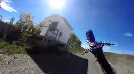 Dirt bike tries no hand wheelie for 1 second and falls right off his bike