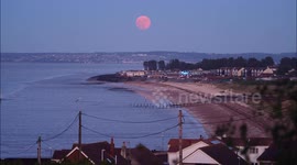 Stunning full Strawberry Moon seen rising above Kent coast, UK