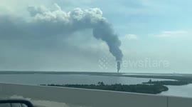 Lightning strike triggers Louisiana oil tank farm fire, prompting urgent evacuations