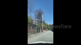 Massive blaze engulfs Oakridge construction site, sending black smoke into sky