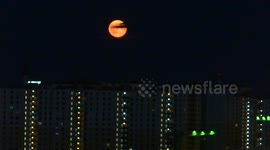 The Strawberry Moon appears on the sky of St Petersburg, Russia