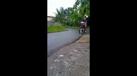 Brave biker's close call: dismantled motorbike catches fire during test run