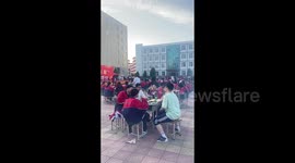 Chinese high school hosts barbecue for students ahead of national college entrance exams