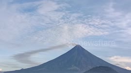 Smoke drifts from crater as Philippines Mayon Volcano rumbles with activity