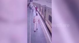 Vigilant cop rushes to aid of woman who slipped while getting down moving train in northern India