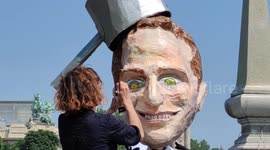 Pension reform: protesters create an artistic head of french President Macron wearing a pan, symbol of the famous pans-beating and pots-banging as mark of protest. Paris, France, Invalides. 6 june 2023