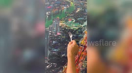 Artistic father paints amazing city nightlife scenes using dinner fork
