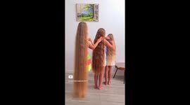 THIS long haired mother-of-two twins has proudly revealed pictures of how her mini-me Rapunzel girls are following in her footsteps by growing their hair down to the ground as a mark of respect.