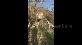 A PHOTOGRAPHER was shocked when she disturbed the ritual of a local cult while she was exploring an abandoned WW2 bunker.