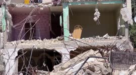 A crane demolishes houses belonging to the Palestinian family in East Jerusalem after the Israeli municipality in Jerusalem has issued a demolition order for the houses