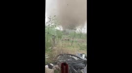 Fury unleashed: a farmer's glimpse into Fuxin's terrifying tornado