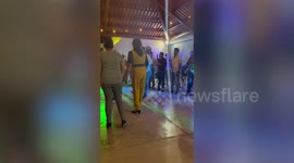 Dancer hits stomach when she slips on wet floor