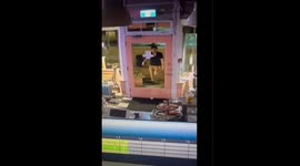 Bizarre moment man breaks into pastry shop, cleans up and takes selfies before making off with cupcakes