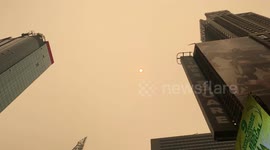 Smoky conditions from wildfires in Canada turned Times Square and the streets of New York City hues of orange on Wednesday morning