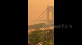 George Washington Bridge disappears under Canadian wildfires smoke