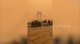 Video shows George Washington Bridge in NYC shrouded in orange smog