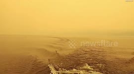 Video shows Keuka Lake in New York shrouded in orange smog