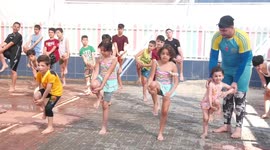 Palestinian children swim in a pool during a swimming lesson in Gaza City.