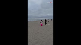 Girl is proposed by her boyfriend at a beach *Heartfelt proposal reaction*