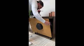 Guy makes fish tank out of old TV by dismantling it, waterproofing inside, and filling it with water