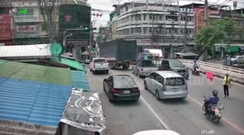 Electricity posts topple onto road when truck snags power lines in Thailand