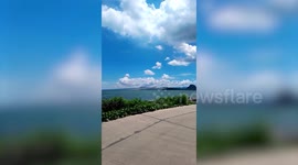 Smoke plume hangs over Taal Volcano lake in the Philippines