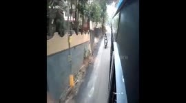 WITNESS hair-raising footage of two students narrowly escaping being crushed between two vehicles.