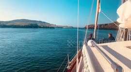 Sailing around the Isle of Eigg, enjoying the British summer on a yacht