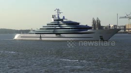 Kaos mega-yacht cruising the River Thames after a visit to London
